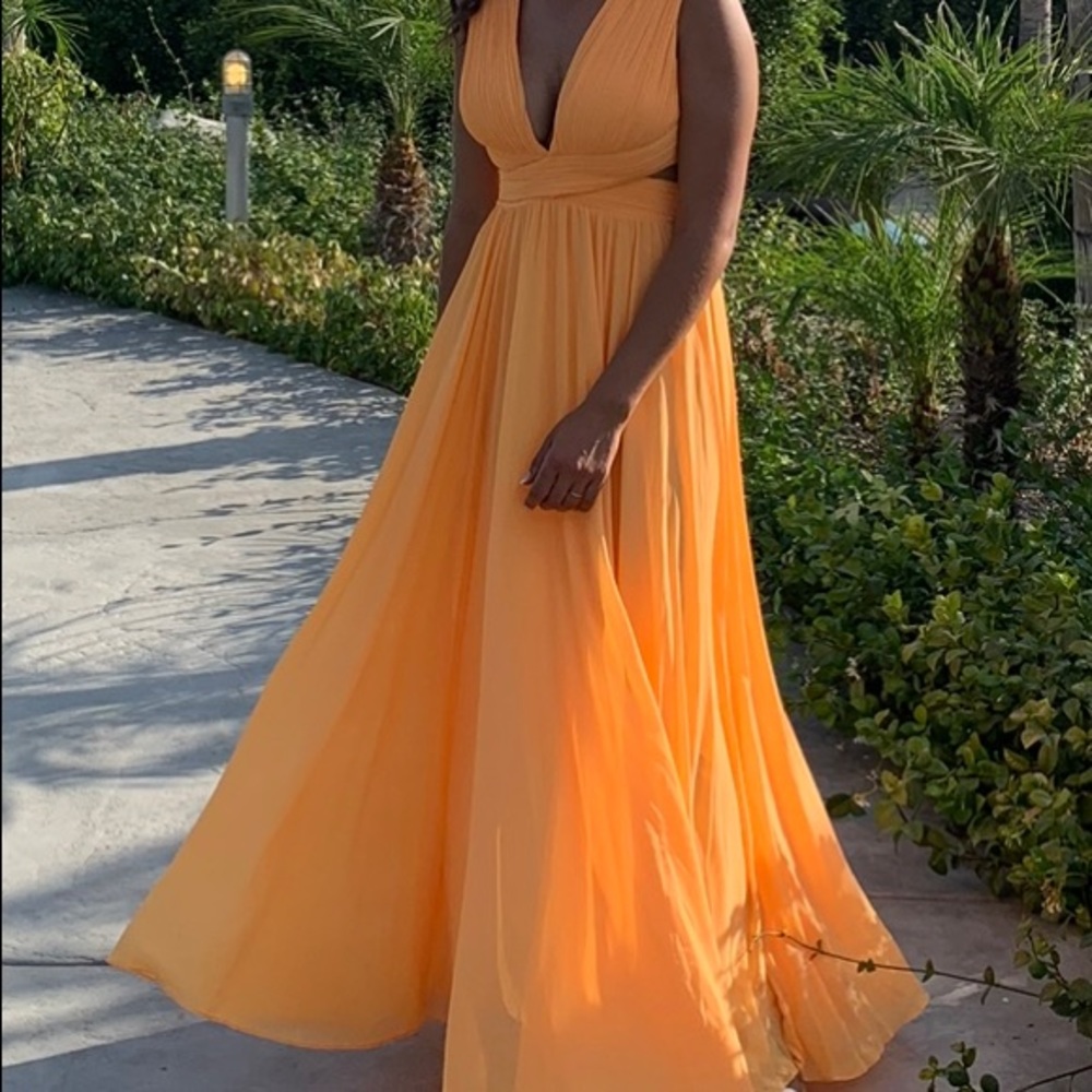 Orange dress. Bridesmaid